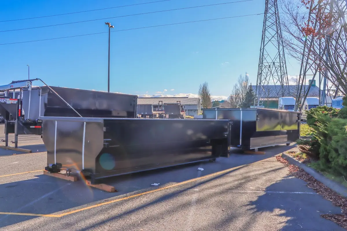 Roll-off dumpster ready for waste disposal at job site for Roofing Dumpster Rental in West Point